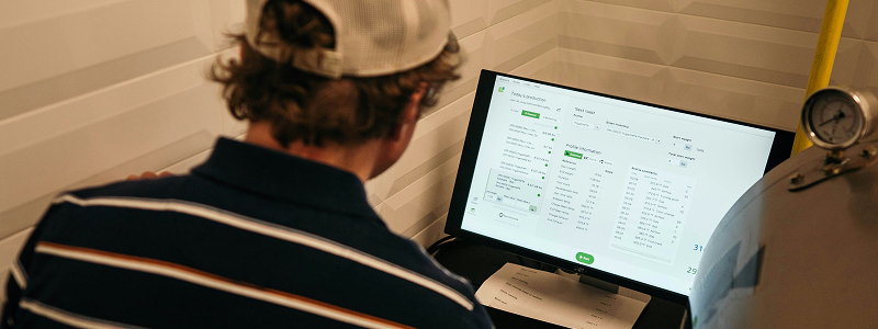Person viewing analytics dashboard on laptop
